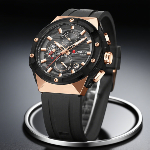 Black and rose gold watch with 'Curren' brand on a dark background