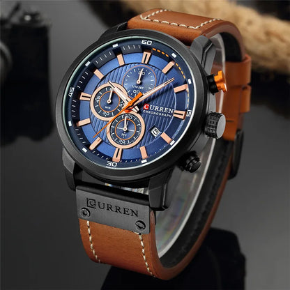Curren watch with brown leather strap and blue dial on a dark background